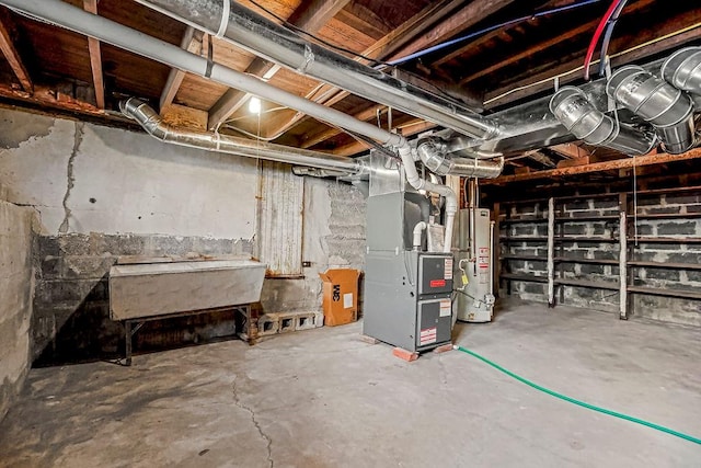 basement with heating unit and gas water heater