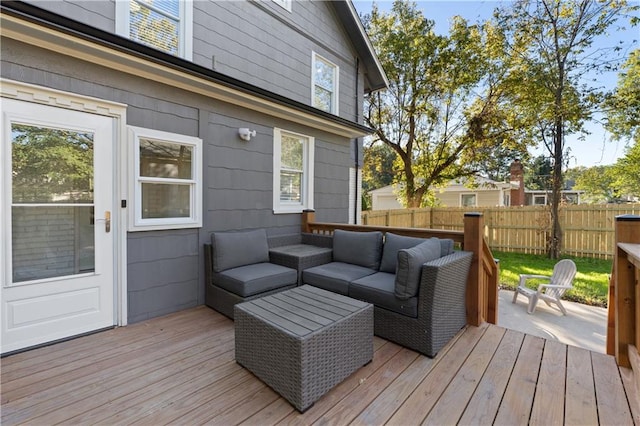 deck featuring outdoor lounge area