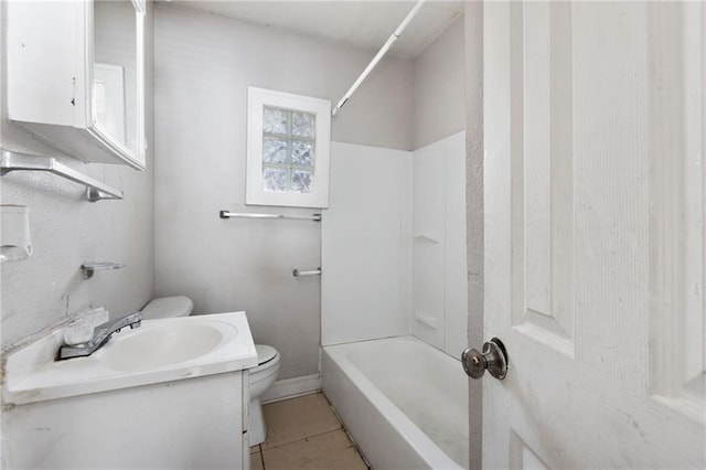 full bathroom with vanity, toilet, tile patterned floors, and tub / shower combination