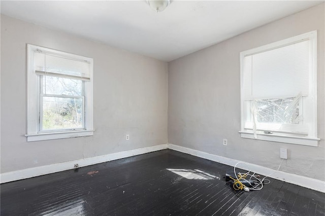 empty room featuring hardwood / wood-style flooring