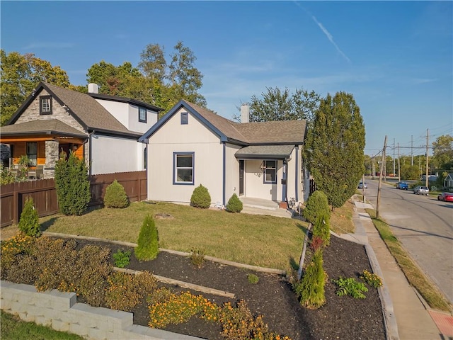 view of front of home with a front yard