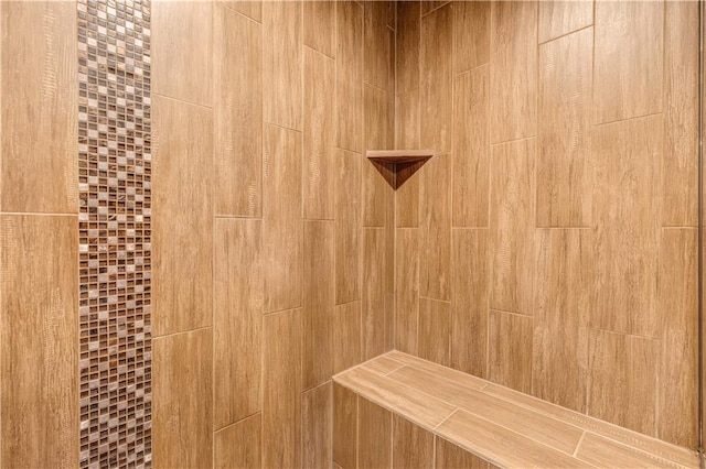 interior details featuring a shower