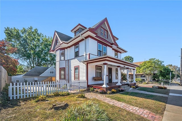 victorian-style house featuring covered porch