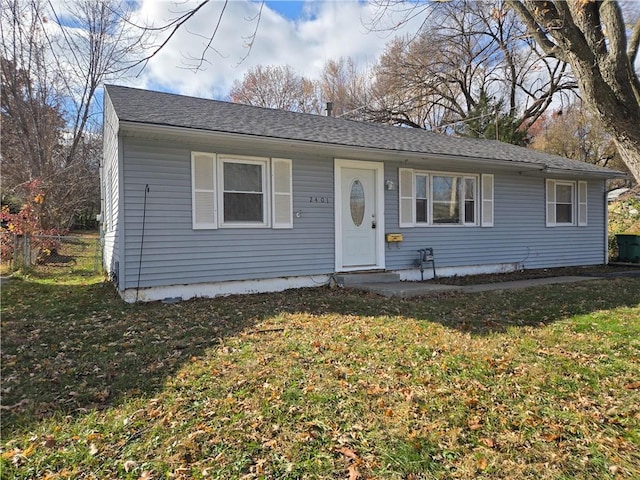 view of front of home with a front yard