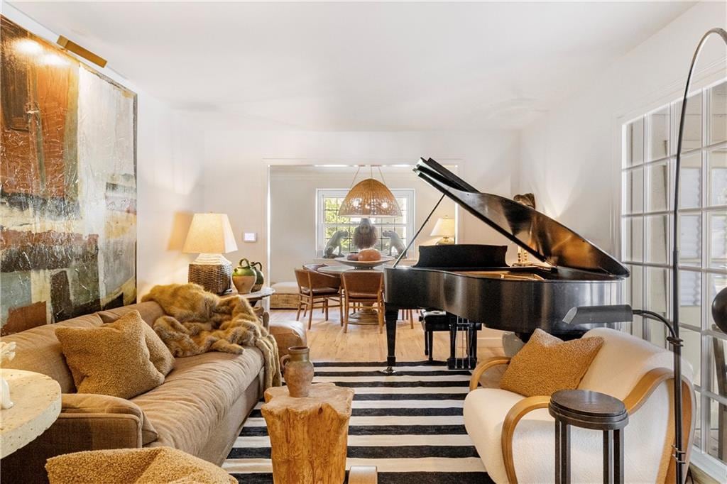 sitting room featuring hardwood / wood-style floors