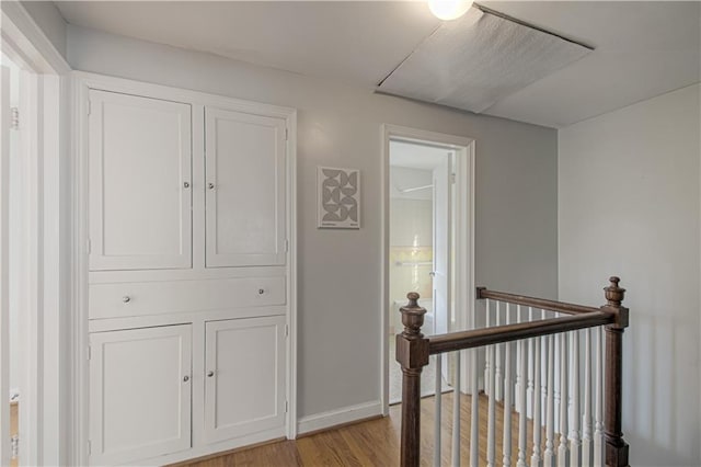 hallway featuring light hardwood / wood-style flooring