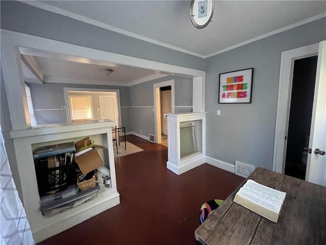 living room featuring crown molding