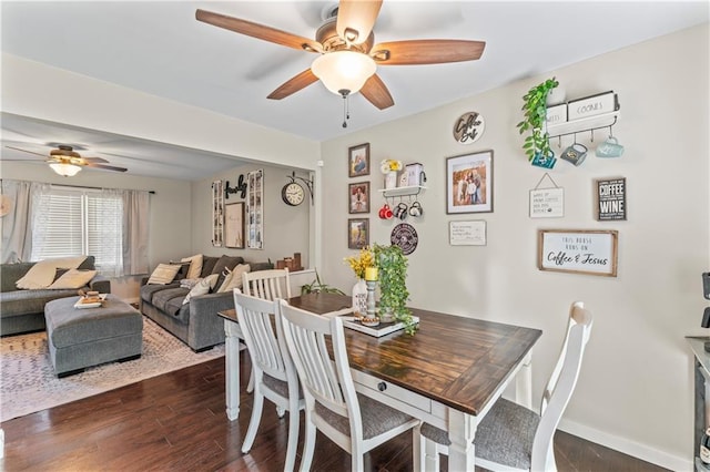 dining room featuring ceiling fan and dark hardwood / wood-style flooring