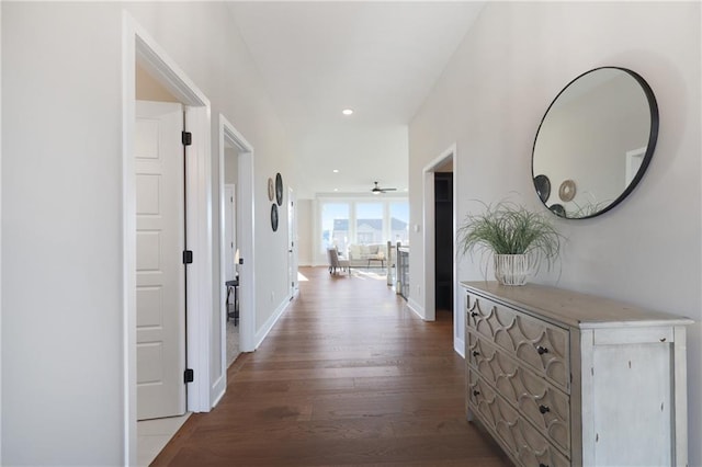 corridor featuring hardwood / wood-style floors