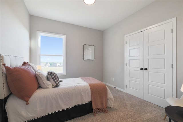 carpeted bedroom featuring a closet