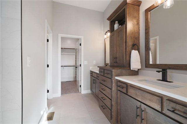 bathroom featuring vanity and tile patterned flooring