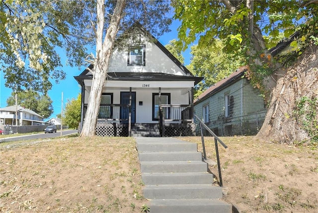 bungalow-style home featuring covered porch