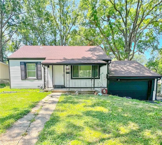 single story home with a front yard and covered porch