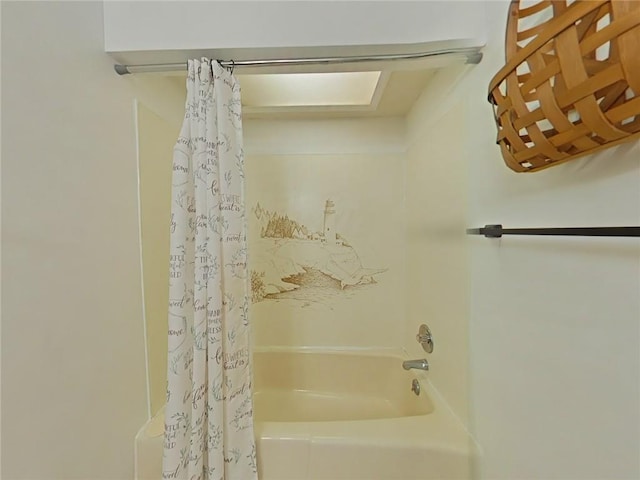 bathroom with shower / bath combination with curtain