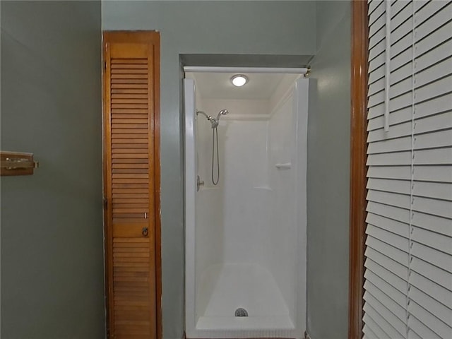 bathroom featuring a stall shower