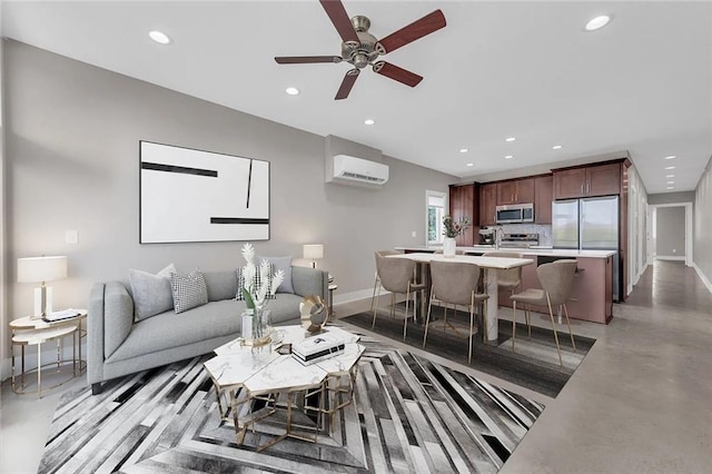 living room featuring concrete floors, ceiling fan, and a wall mounted air conditioner