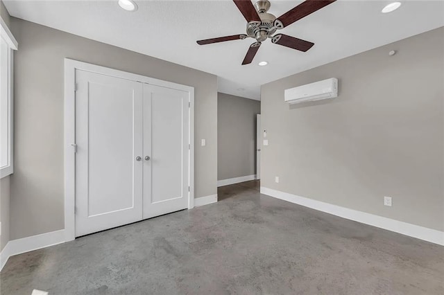 unfurnished bedroom featuring a closet, ceiling fan, and a wall mounted AC