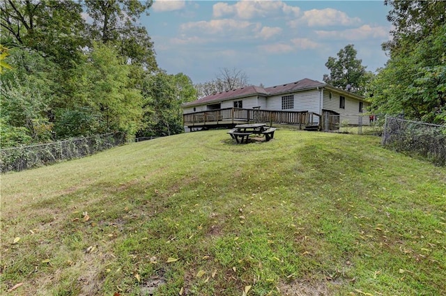 view of yard with a deck