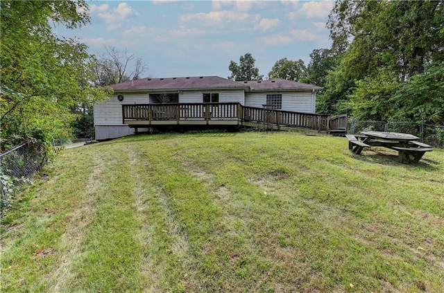 view of yard featuring a wooden deck