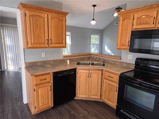 kitchen with dark hardwood / wood-style flooring, sink, black appliances, and lofted ceiling