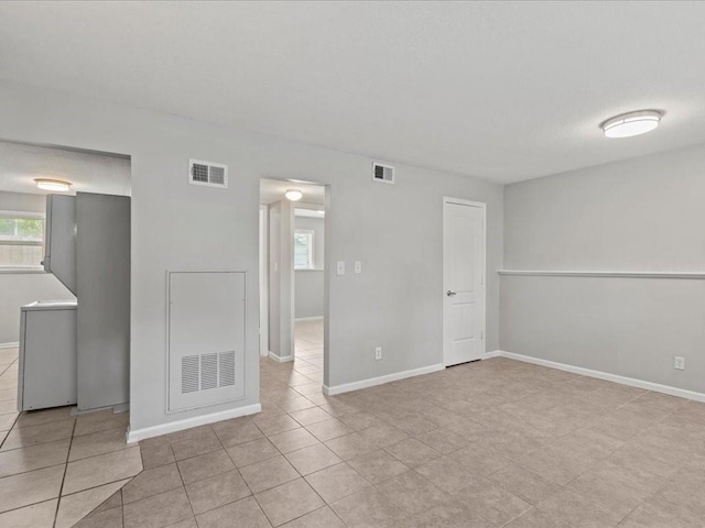 view of tiled spare room