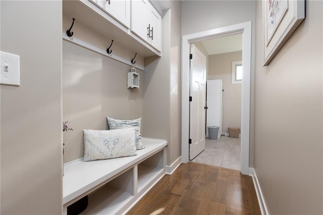 mudroom with dark hardwood / wood-style floors