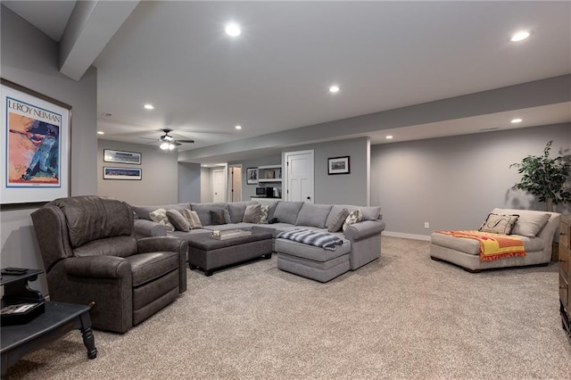 living room with light carpet and ceiling fan