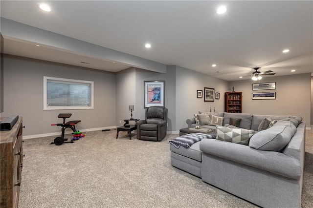 living room featuring light carpet and ceiling fan