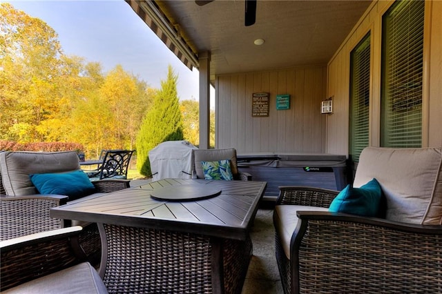 balcony with grilling area and outdoor lounge area