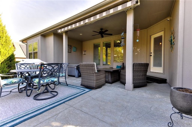 view of patio / terrace featuring ceiling fan