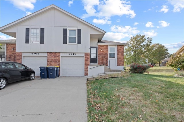 split level home featuring a front lawn and a garage