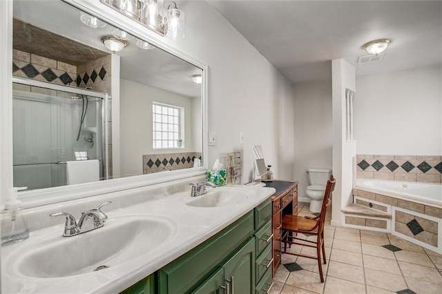 403 S Jackson St, Archie, MO 64725 - full bathroom featuring tile patterned floors, a garden tub, double vanity, and a stall shower