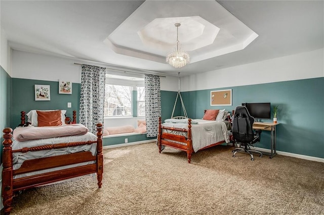 403 S Jackson St, Archie, MO 64725 - carpeted bedroom with a raised ceiling and a desk
