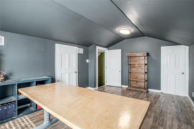 403 S Jackson St, Archie, MO 64725 - office with dark wood-style flooring and vaulted ceiling