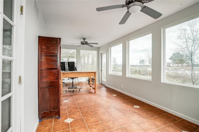 403 S Jackson St, Archie, MO 64725 - sunroom / solarium featuring tile patterned floors and baseboards