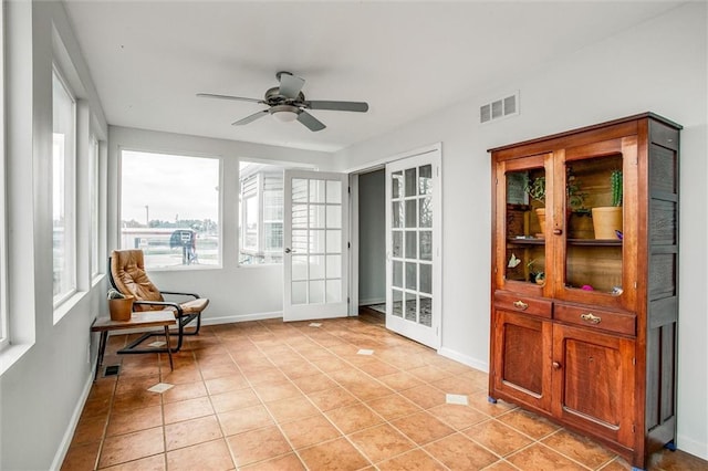 403 S Jackson St, Archie, MO 64725 - sunroom featuring french doors
