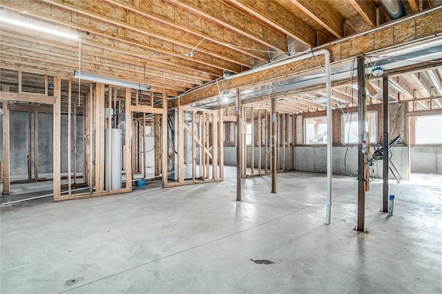 403 S Jackson St, Archie, MO 64725 - basement featuring plenty of natural light
