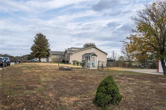 403 S Jackson St, Archie, MO 64725 - view of yard with a fire pit