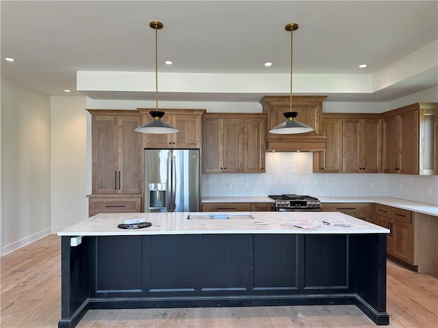 2846 W 133rd Ter, Leawood, KS 66209 - kitchen with appliances with stainless steel finishes, a kitchen island, tasteful backsplash, light wood-style flooring, and light countertops