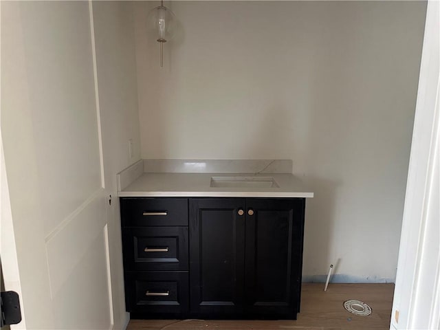2846 W 133rd Ter, Leawood, KS 66209 - bathroom featuring wood finished floors and vanity