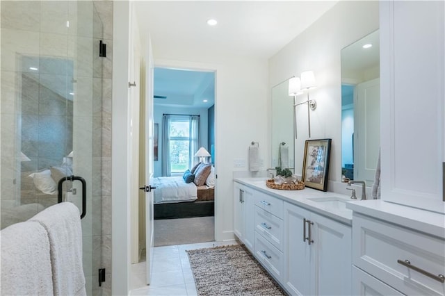 2846 W 133rd Ter, Leawood, KS 66209 - full bath featuring double vanity, connected bathroom, a stall shower, recessed lighting, and tile patterned floors
