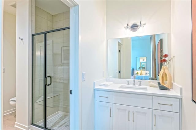 2846 W 133rd Ter, Leawood, KS 66209 - full bathroom featuring a stall shower, vanity, toilet, and baseboards