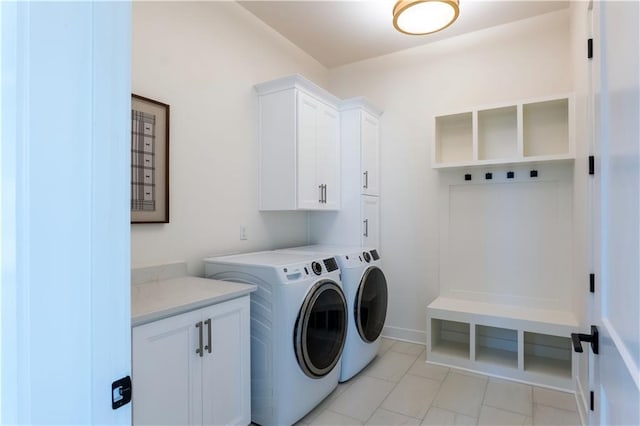 2846 W 133rd Ter, Leawood, KS 66209 - laundry area with cabinet space, independent washer and dryer, and light marble finish flooring