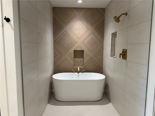 2846 W 133rd Ter, Leawood, KS 66209 - full bathroom with tile walls, a freestanding tub, and tile patterned floors