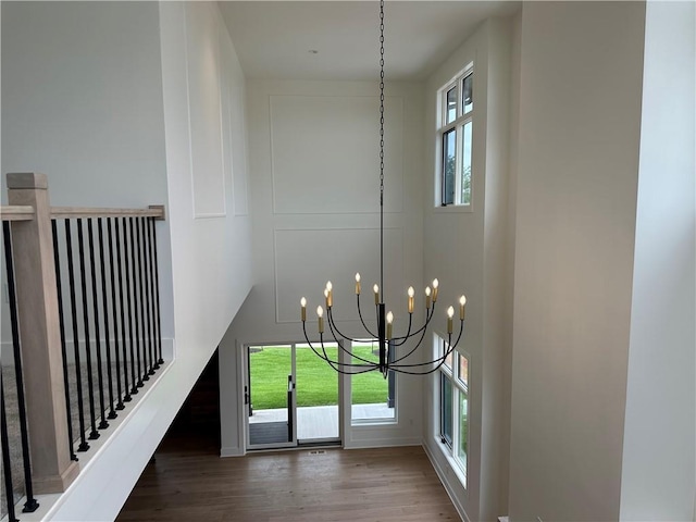 2846 W 133rd Ter, Leawood, KS 66209 - detailed view of a chandelier and wood finished floors