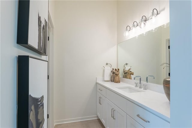 2860 W 133rd Ter, Leawood, KS 66209 - bathroom featuring baseboards and vanity