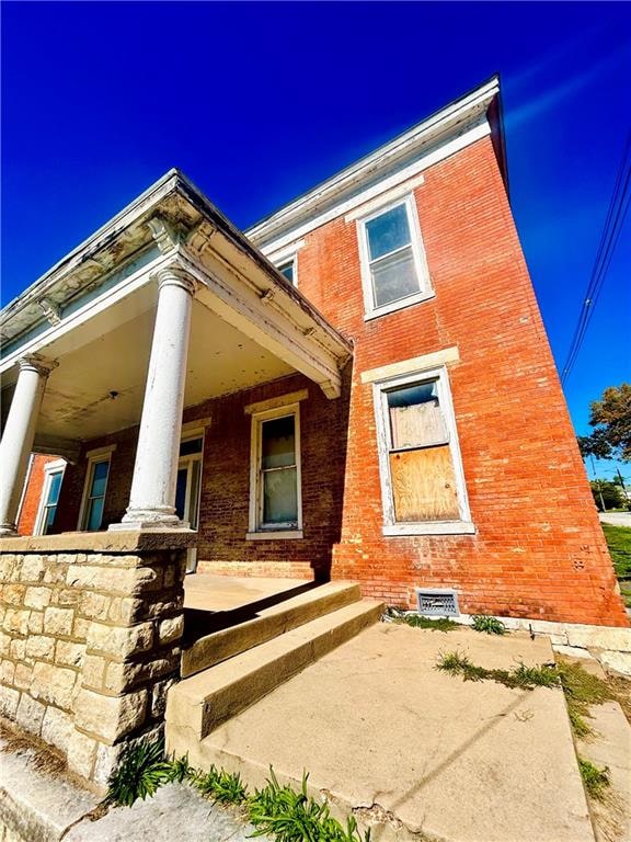 view of home's exterior featuring a porch