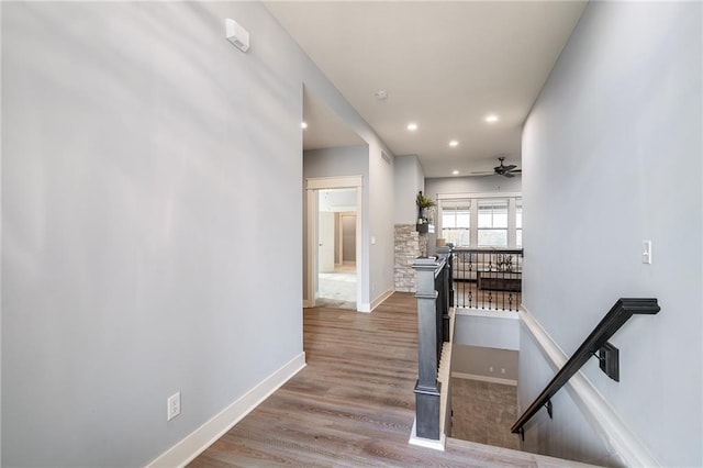 hallway featuring hardwood / wood-style flooring