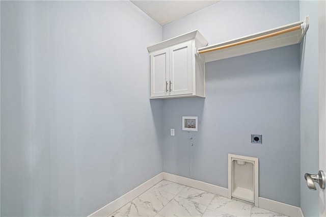 clothes washing area with cabinets, washer hookup, and electric dryer hookup