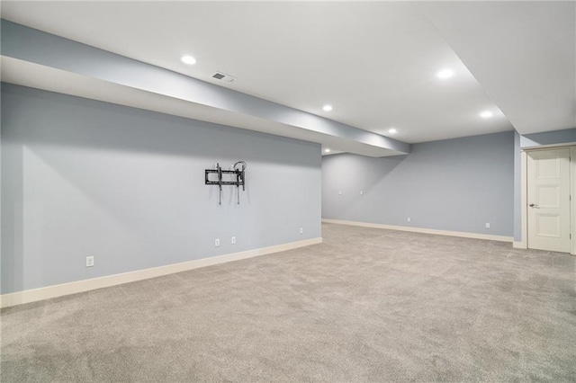 basement with light colored carpet